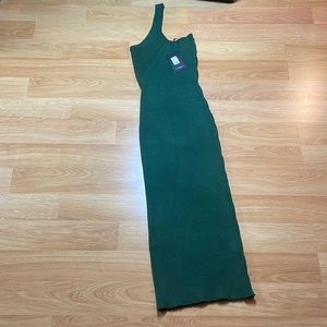 Long body con knit green dress with detailing on the side
